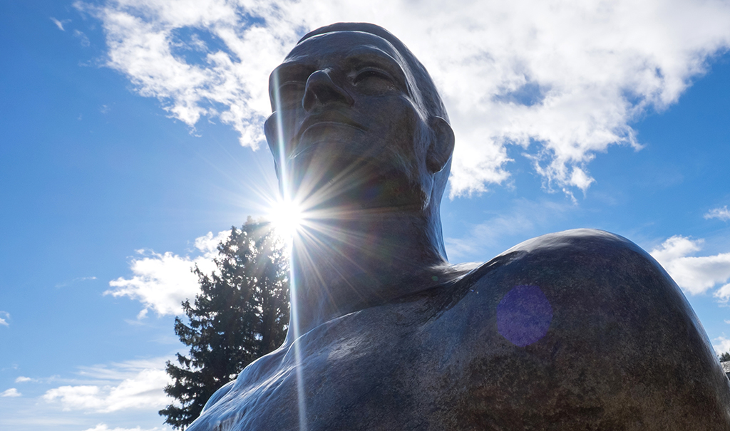 Close up of the Spartan statue with the sun highlighting it