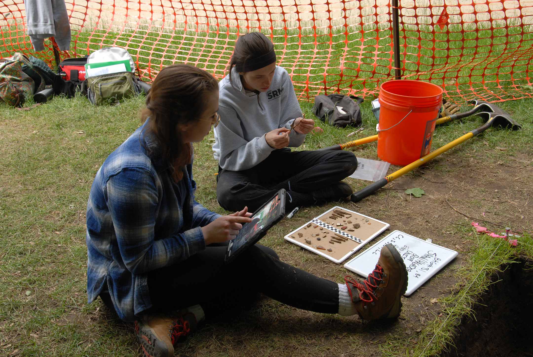 students collect artifacts